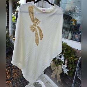 Elegant Cream Poncho with Gold Bow Accent
